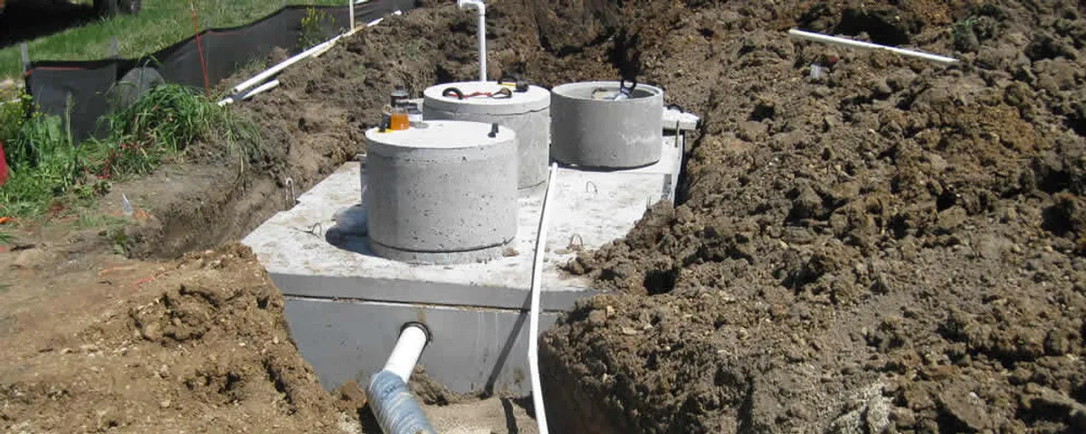 Septic system repair and installation site with tank access ports in San Mateo, CA